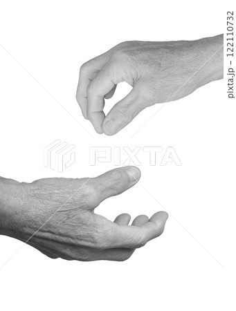 Elderly female hand open and reaching, palm up, fingers slightly curled, gesture expressing offer or Elderly female hand open and reaching, palm up, fingers slightly curled, gesture expressing offer or 122110732