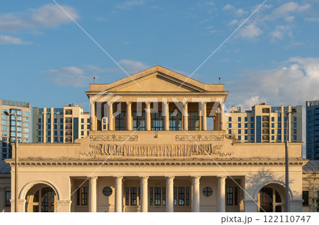 Contrast of old and new architecture, showcasing a classical building with neoclassical columns, Contrast of old and new architecture, showcasing a classical building with neoclassical columns, 122110747