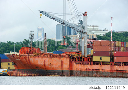 ships in a commercial port in rainy weather in Vladivostok ships in a commercial port in rainy weather in Vladivostok 122111449