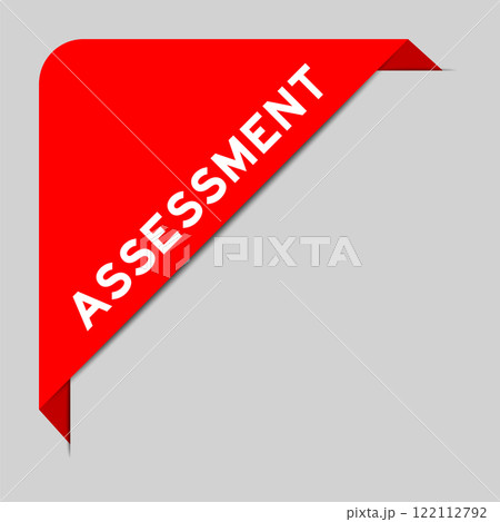 Red color of corner label banner with word assessmnet on gray background 122112792