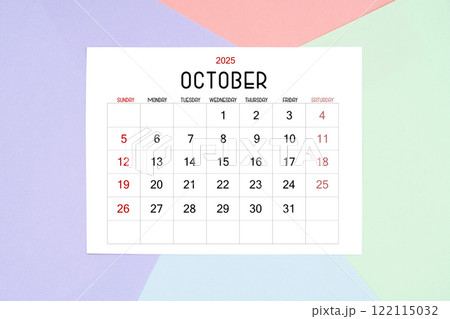 October calendar card for 2025 year on colorful background. Flat lay. October calendar card for 2025 year on colorful background. Flat lay. 122115032