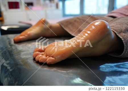 process of foot care in a beauty salon 122115330