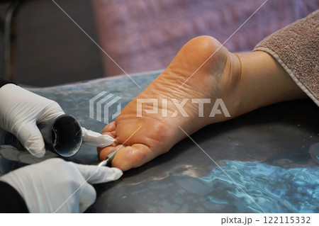 process of foot care in a beauty salon process of foot care in a beauty salon 122115332