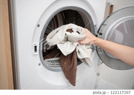 White washing machine in a utility room 122117107