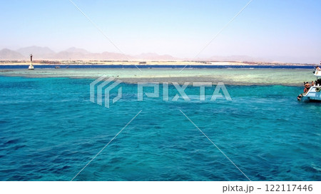 Enjoying a Boat Trip to a Stunning Coral Island Near Sharm El Sheikh in the Red Sea Egypt Enjoying a Boat Trip to a Stunning Coral Island Near Sharm El Sheikh in the Red Sea Egypt 122117446