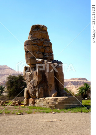 Ancient Colossi of Memnon Statues in Egypt, Depicting Pharaoh Amenhotep III on the Eastern Bank Ancient Colossi of Memnon Statues in Egypt, Depicting Pharaoh Amenhotep III on the Eastern Bank 122118231