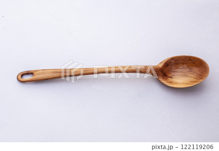 Wooden kitchen utensils stacked view close up isolated 122119206