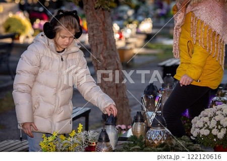 Autumn is a time to honor and remember loved ones at the cemetery, cherishing shared moments 122120616