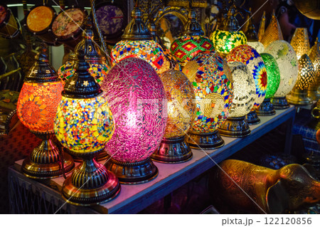 Shop of Arabic style lamps in different colors illuminated at Marrakech Shop of Arabic style lamps in different colors illuminated at Marrakech 122120856