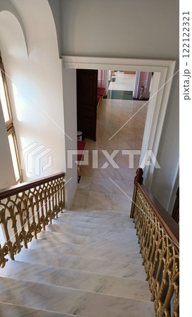 An Elegant Staircase That Gracefully Leads to a Bright and Spacious Open Living Area 122122321
