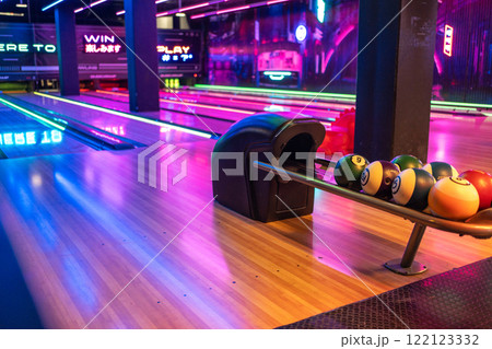 Various bowling balls arranged in stand at Various bowling balls arranged in stand at 122123332