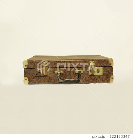A Vintage Brown Suitcase with Beautiful Brass Accents Ideal for Your Unique Adventures 122123347