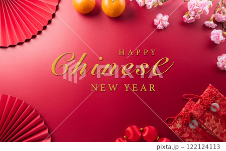Chinese new year decorations background concept made from red packet, orange and plum blossom. 122124113
