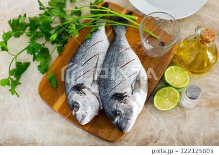 delicious and healthy lunch option is dorado baked with lime juice 122125805