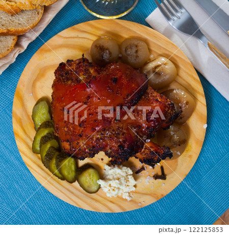 Roast pork knuckle with vegetables Roast pork knuckle with vegetables 122125853