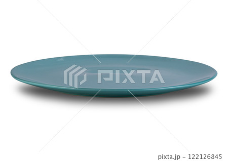 Side view of empty shallow blue ceramic plate isolated on white background. 122126845