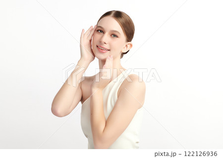 Beautiful young woman with clean fresh skin on white background, Face care, Facial treatment, Cosmetology, beauty and spa, women portrait. Beautiful young woman with clean fresh skin on white background, Face care, Facial treatment, Cosmetology, beauty and spa, women portrait. 122126936