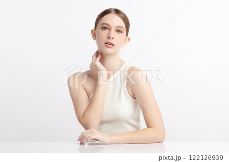 Beautiful young woman with clean fresh skin on white background, Face care, Facial treatment, Cosmetology, beauty and spa, women portrait. 122126939