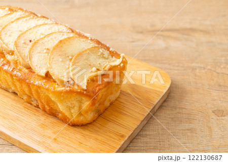 apple loaf crumbled on wood board apple loaf crumbled on wood board 122130687