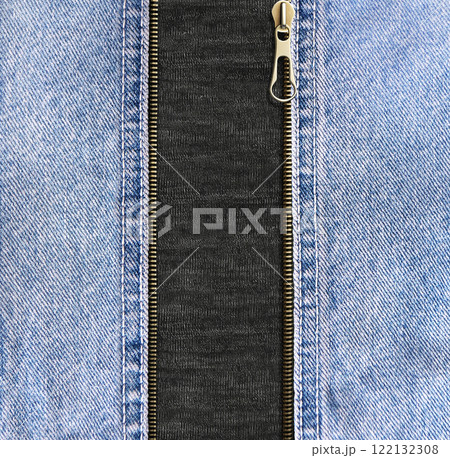 Square background with blue denim borders, zipper opened and black cotton texture. Decorative backdrop with Unzipped zipper or fastener, light blue and gray color jeans fabric. Copy space for text 122132308
