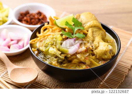 Northern Thai food (Khao Soi), Spicy curry noodles soup with chicken, Local Thai food 122132687