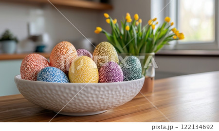 Eco-Friendly Abstract Design of Dyed Easter Eggs in a Bowl with Spring Flowers in a Modern Setting Eco-Friendly Abstract Design of Dyed Easter Eggs in a Bowl with Spring Flowers in a Modern Setting 122134692