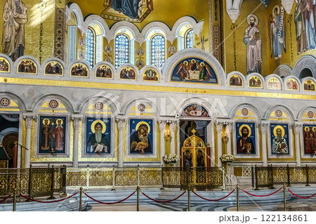 Belgrade, Serbia- 10162024: The Temple Of Saint Sava indoor interior, people pray in an Orthodox church, frescoes on the ceilings and walls of the church 122134861