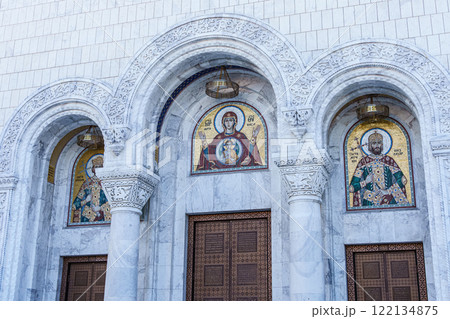 Belgrade, Serbia- 10162024: The Temple Of Saint Sava indoor interior, people pray in an Orthodox church, frescoes on the ceilings and walls of the church 122134875