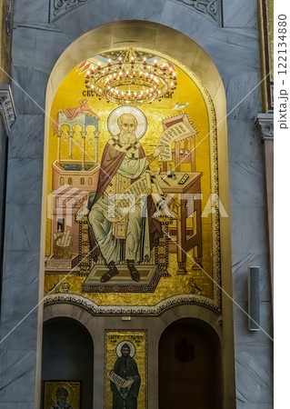 Belgrade, Serbia- 10162024: The Temple Of Saint Sava indoor interior, people pray in an Orthodox church, frescoes on the ceilings and walls of the church Belgrade, Serbia- 10162024: The Temple Of Saint Sava indoor interior, people pray in an Orthodox church, frescoes on the ceilings and walls of the church 122134880