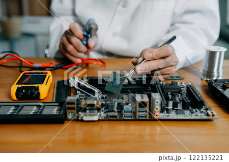 Repairing and upgrade mobile phone, electronic, computer hardware and technology concept. Repairing and upgrade mobile phone, electronic, computer hardware and technology concept. 122135221