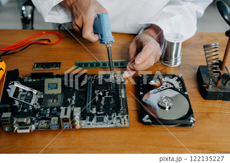 Repairing and upgrade mobile phone, electronic, computer hardware and technology concept. Repairing and upgrade mobile phone, electronic, computer hardware and technology concept. 122135227