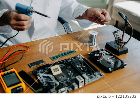 Repairing and upgrade mobile phone, electronic, computer hardware and technology concept. Repairing and upgrade mobile phone, electronic, computer hardware and technology concept. 122135232
