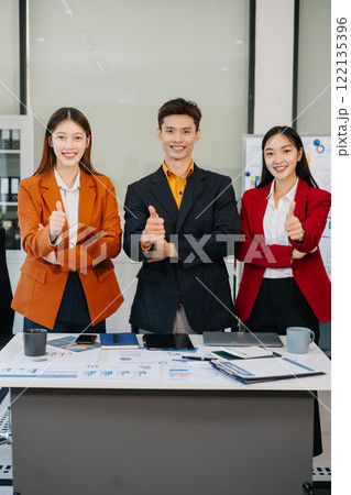Business team creative businesspeople coworker in office Happy to be successful partnership teamwork success concept. 122135396