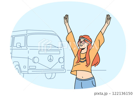 Hippie girl goes on summer travel in minivan and raises hands, rejoicing at opportunity to relax 122136150