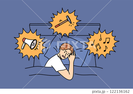 Noisy neighbors disturb sleep of irritated man lying in bed at night and in need of sleeping pills 122136162