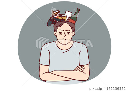 Angry man suffering from bad habits stands with garbage in head and looks at screen 122136332