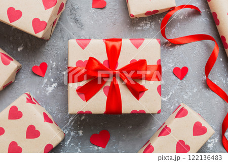 Creative gift box with decorations for the holiday, top view. Birthday and valentine present Creative gift box with decorations for the holiday, top view. Birthday and valentine present 122136483