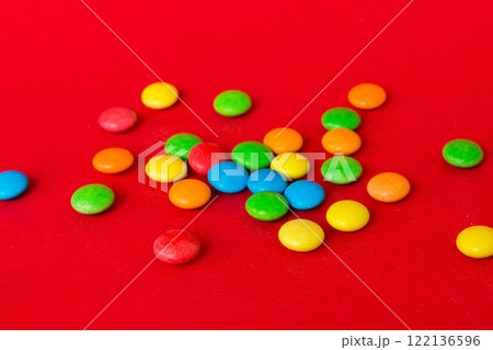 Pile of delicious colorful sweet candies on colored background top view. Confectionery decor Pile of delicious colorful sweet candies on colored background top view. Confectionery decor 122136596
