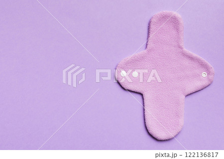 Eco-friendly reusable fabric women's pads. set of colorful bright reusable menstrual pads. zero waste woman periods concept top view with copy space 122136817