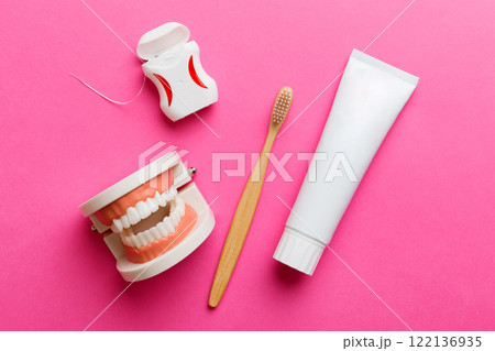 Mouthwash and other oral hygiene products on colored table top view with copy space. Flat lay. Dental hygiene. Oral care kit. Dentist concept 122136935