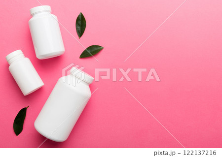 supplement pills with medicine bottle health care and medical top view. Vitamin tablets. Top view mockup bottle for pills and vitamins with green leaves, natural organic bio supplement, copy space supplement pills with medicine bottle health care and medical top view. Vitamin tablets. Top view mockup bottle for pills and vitamins with green leaves, natural organic bio supplement, copy space 122137216