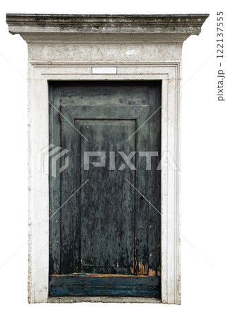 Aged wooden door surrounded by marble frame Aged wooden door surrounded by marble frame 122137555