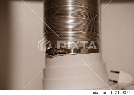 Close-Up of a Silver Duct Hose and Connector Fastener 122139076
