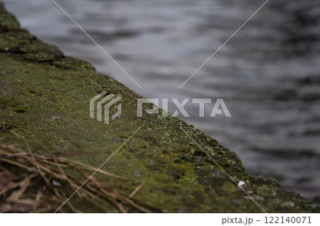 Concrete river fence. The diagonal line. Minimalism Concrete river fence. The diagonal line. Minimalism 122140071