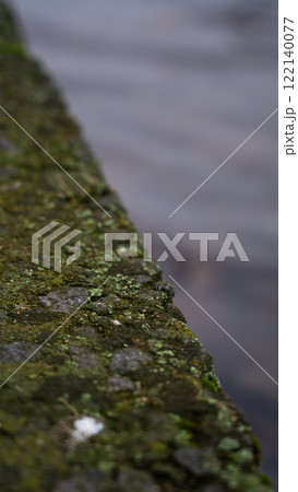 Concrete river fence. The diagonal line. Minimalism Concrete river fence. The diagonal line. Minimalism 122140077