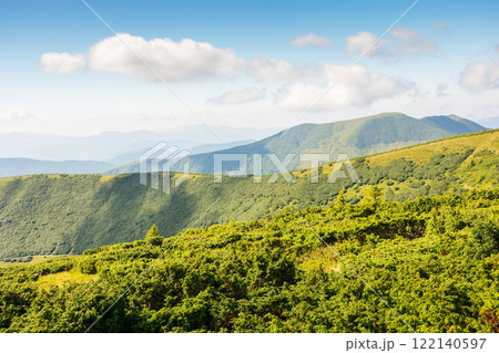 carpathian mountain landscape in summer. natural environment.  beautiful view with rolling hills. alpine scenery of chornohora ridge. green meadow on hillside 122140597