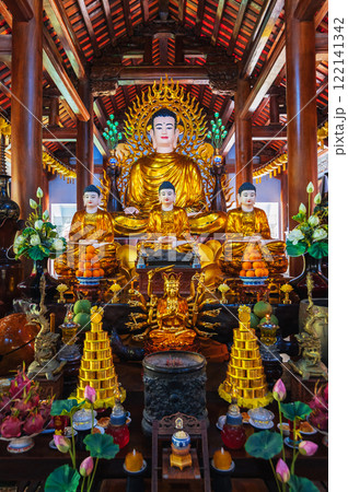 Buddhist golden Buddha statue in a pagoda temple in Nha Trang, Asia. Vietnam 122141342