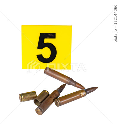 yellow evidence marker with number next to which are cartridges and shells. transparent background yellow evidence marker with number next to which are cartridges and shells. transparent background 122144366