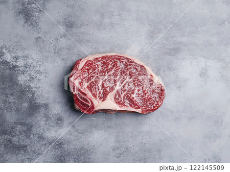 Raw luxury beef wagyu fillet steak on kitchen table top.AI Generative. Raw luxury beef wagyu fillet steak on kitchen table top.AI Generative. 122145509