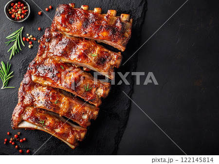Barbeque grilled fresh pork ribs with herbs and tomatoes with rosemary.Macro.AI Generative. 122145814